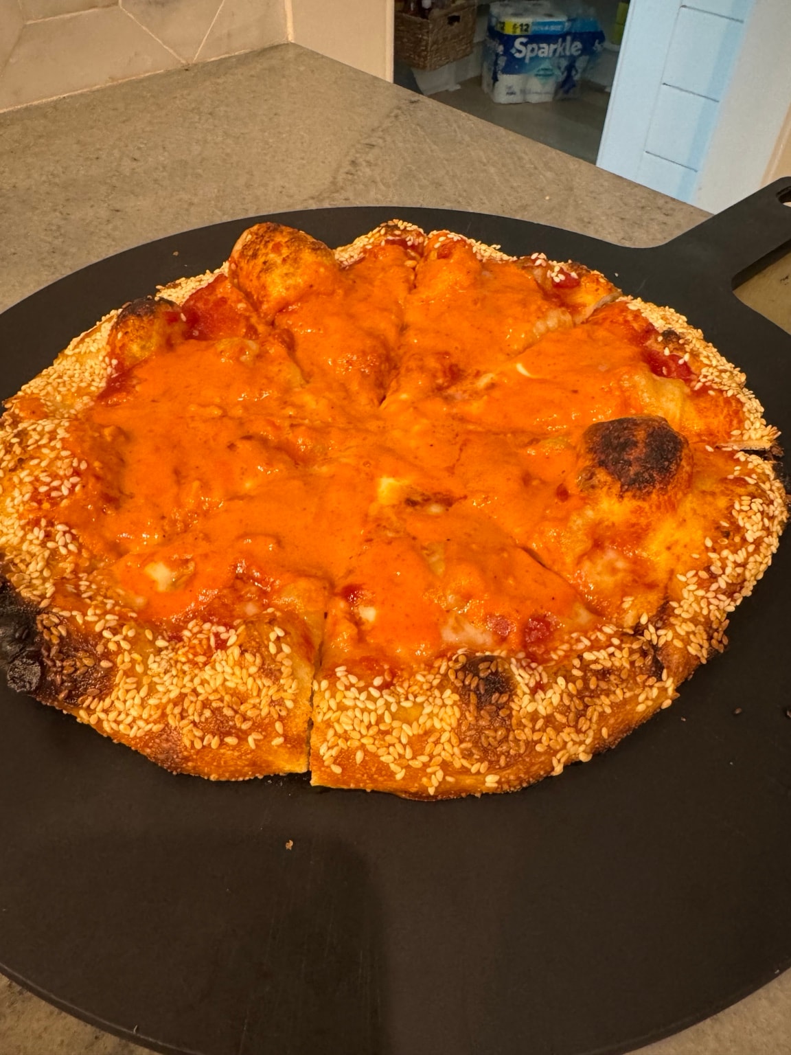 Greg's vodka sauce pizza with sesame crust