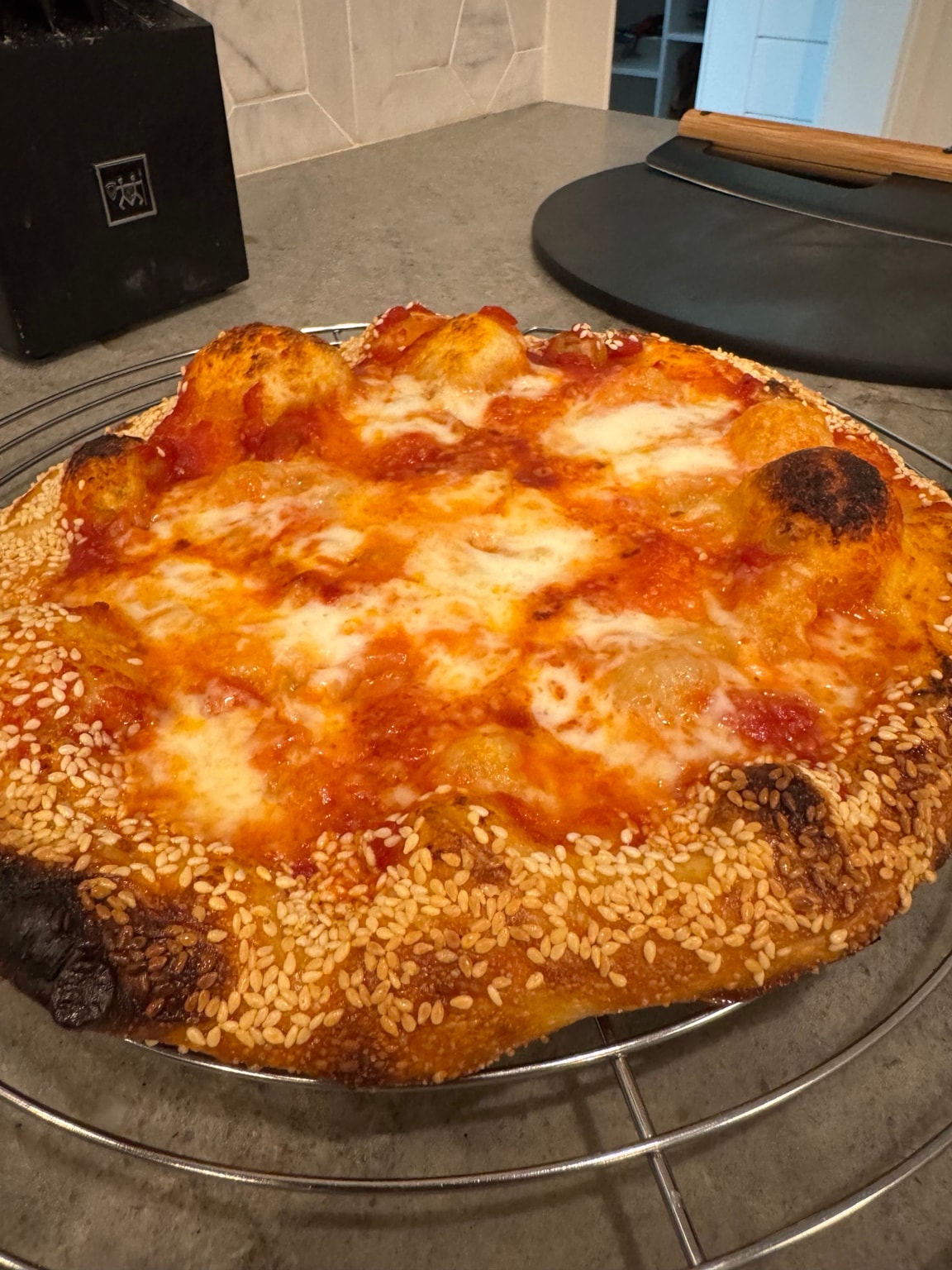 Greg's meatball pizza with sesame crust